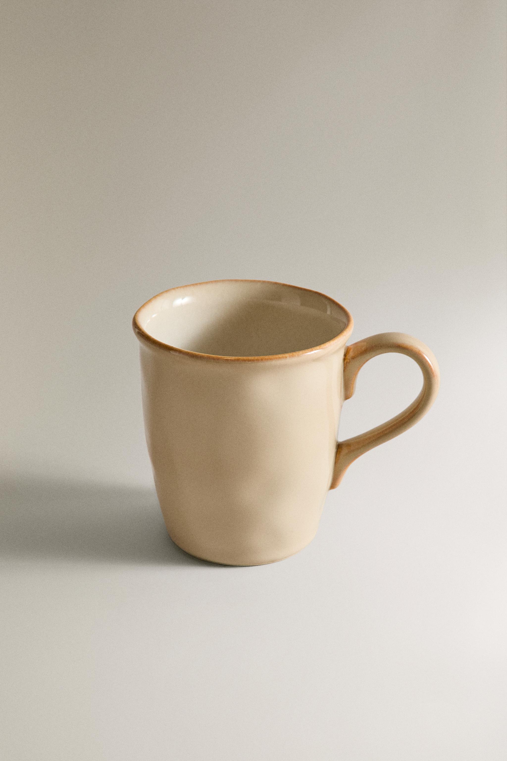 STONEWARE MUG WITH IRREGULAR EDGE